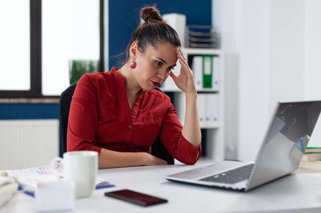 Angry frustrated upset businesswoman having problem with